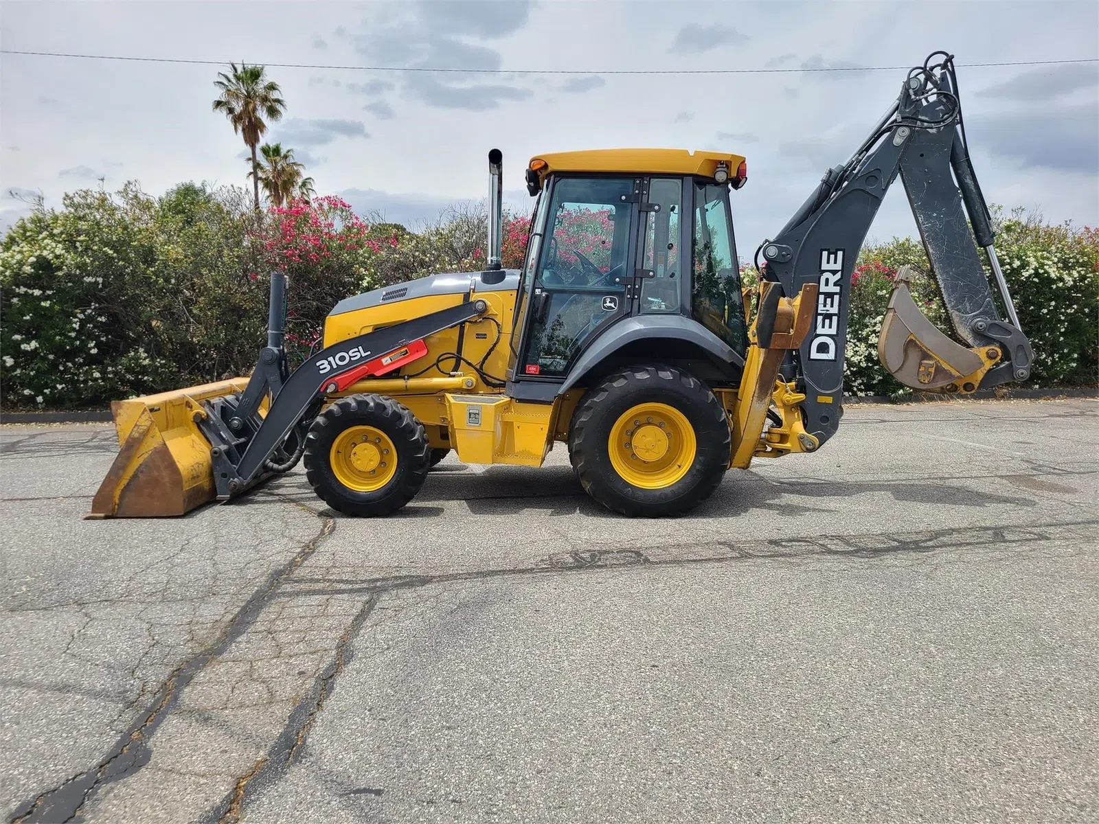 2015 John Deere 310SL Backhoe Loader, photo 1