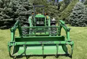 2010 John Deere 6115D MFWD Tractor with Grapple Loader, photo 2